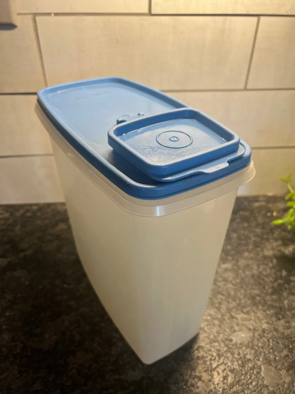 Vintage Tupperware Pour N Store Airtight Cereal Container. Blue lid. 10” tall.